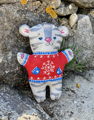 Symbol of the year 2022 Silver tiger in a red sweater