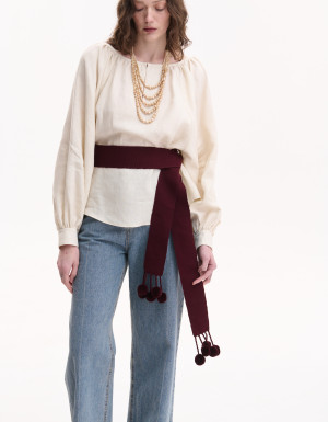 Burgundy woven belt with pom-poms