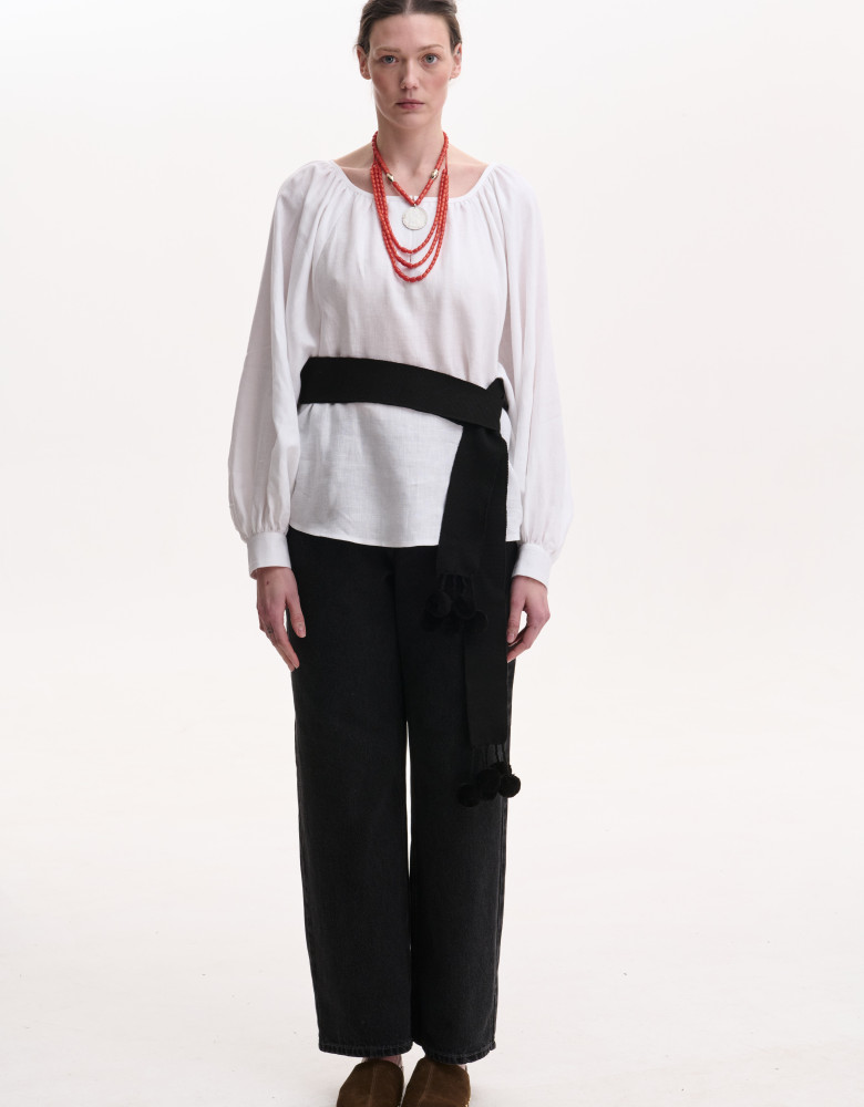 Black woven belt with pom-poms