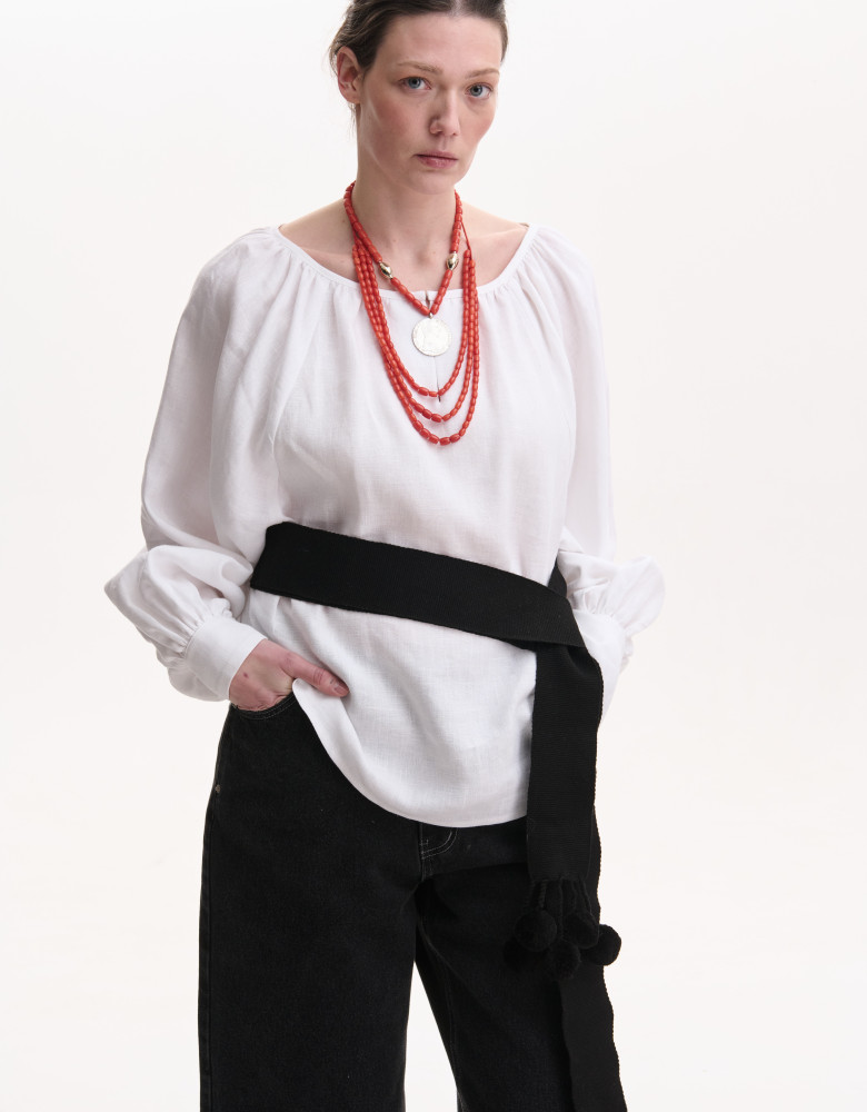 Black woven belt with pom-poms
