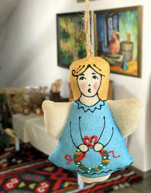 Angel with Christmas wreath