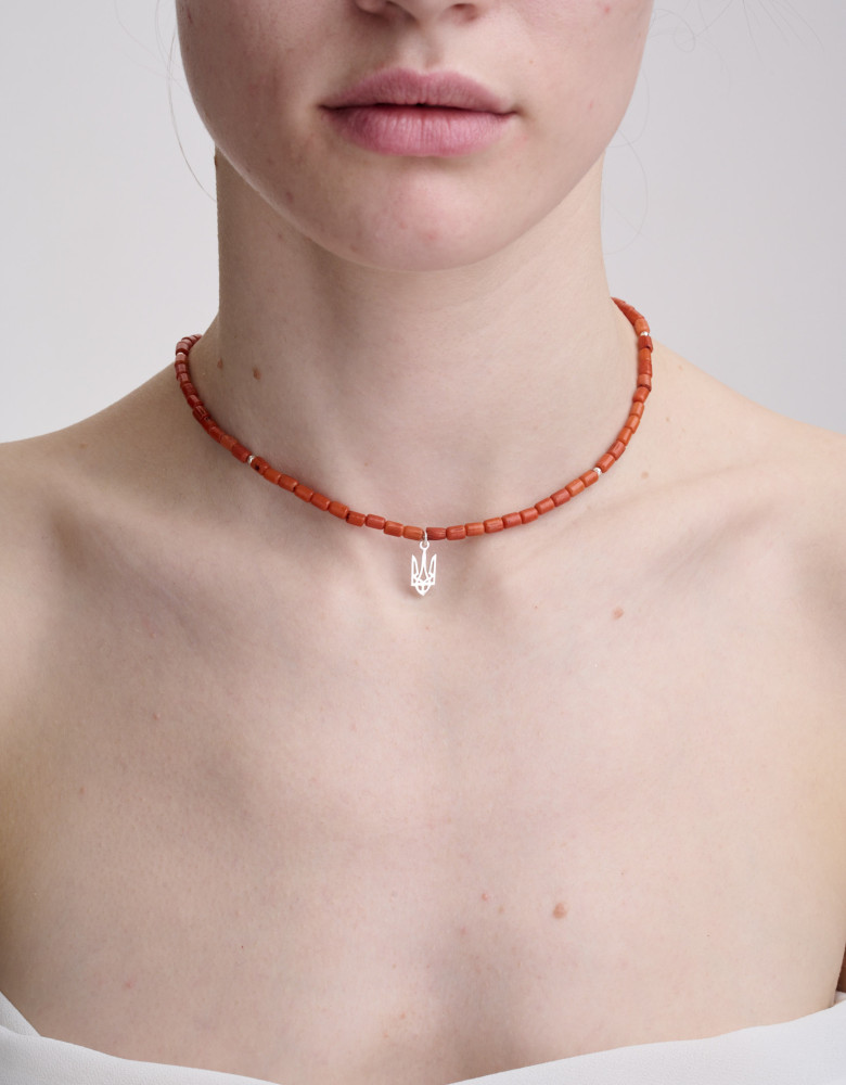 One string terracotta coral necklace, silver trident
