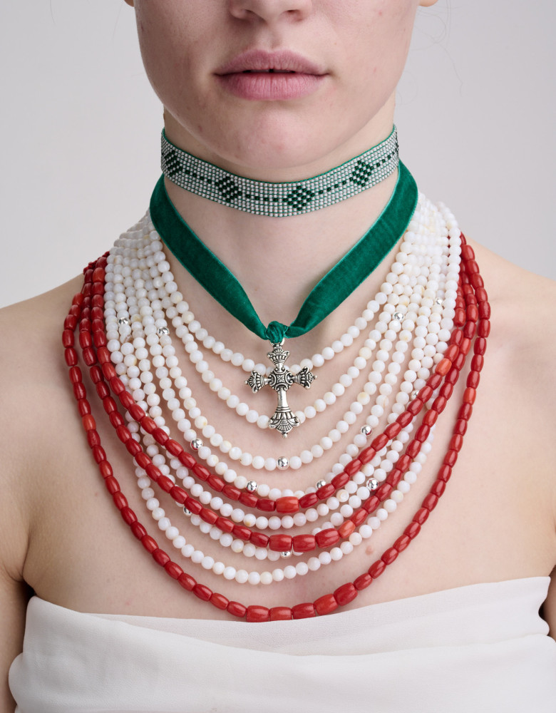 A set of necklaces with mother-of-pearl, terracotta coral, and chokers