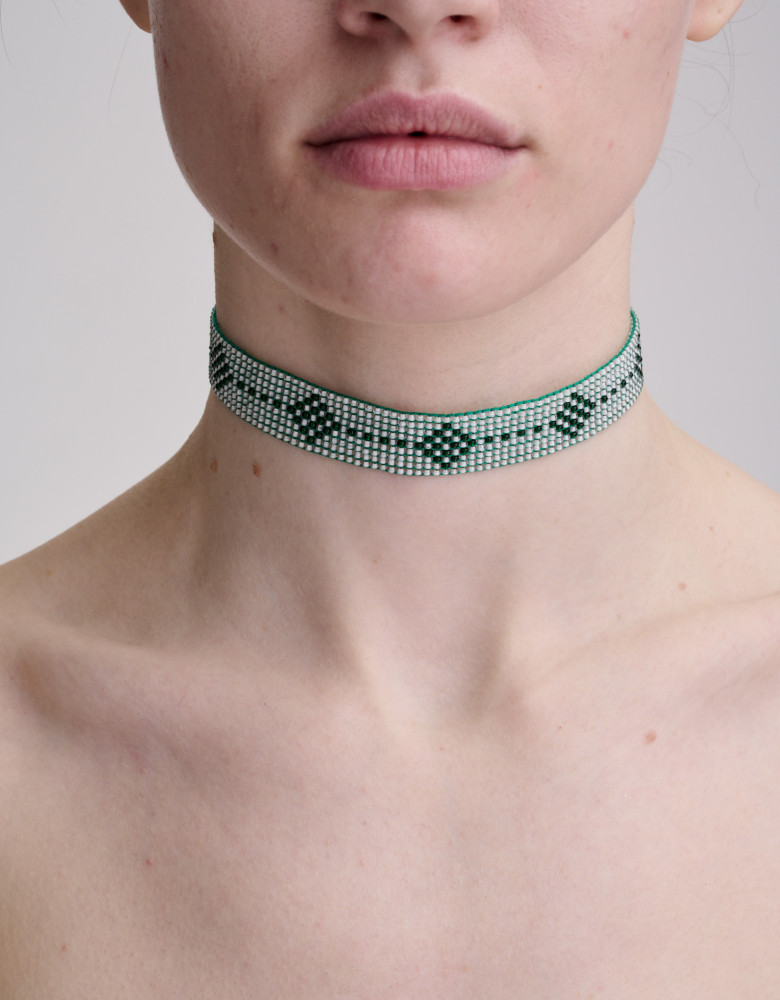 A set of necklaces with mother-of-pearl, terracotta coral, and chokers