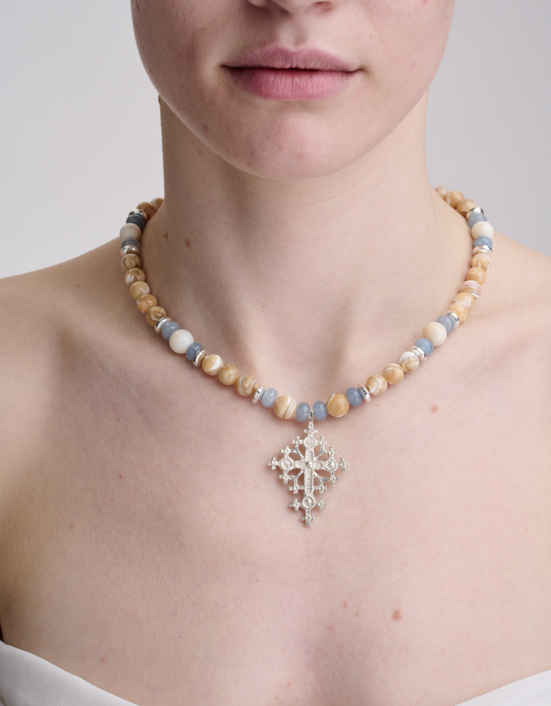 A necklace set with mother-of-pearl, abalone shell, and peasant-style chokers